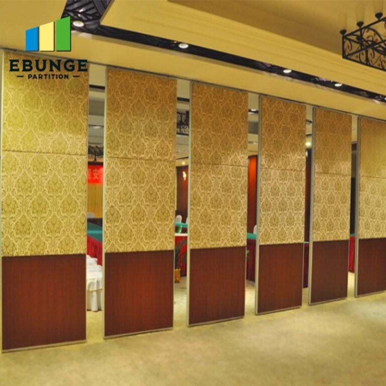 Movable wall system dividing a hotel ballroom with acoustic panels