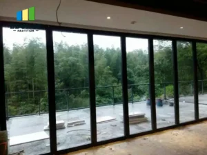 movable partition wall in an exhibition hall with acoustic panels and top-hung track