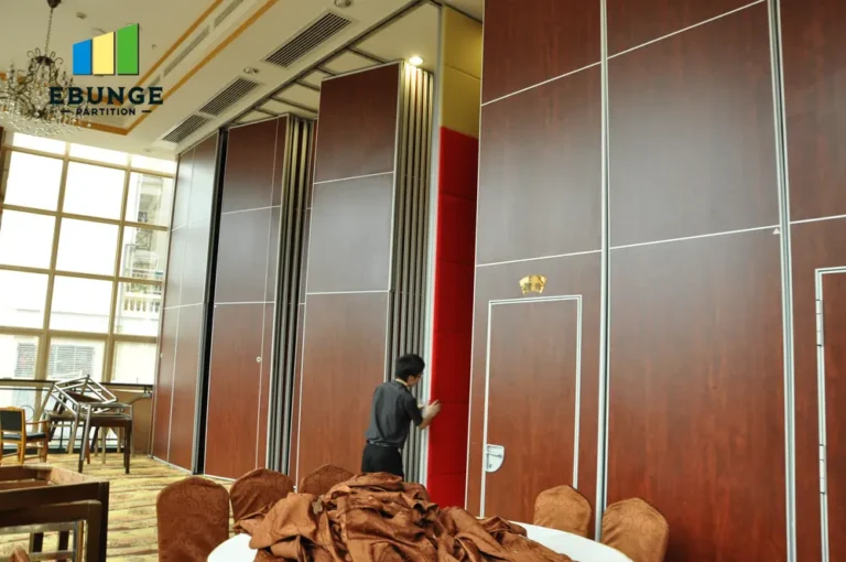 installation team working on a movable partition wall