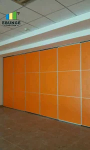 interior designer planning movable partition wall for restaurant private room