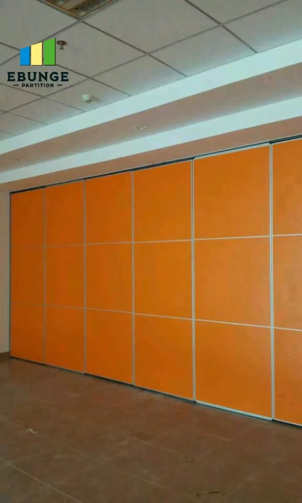 interior designer planning movable partition wall for restaurant private room