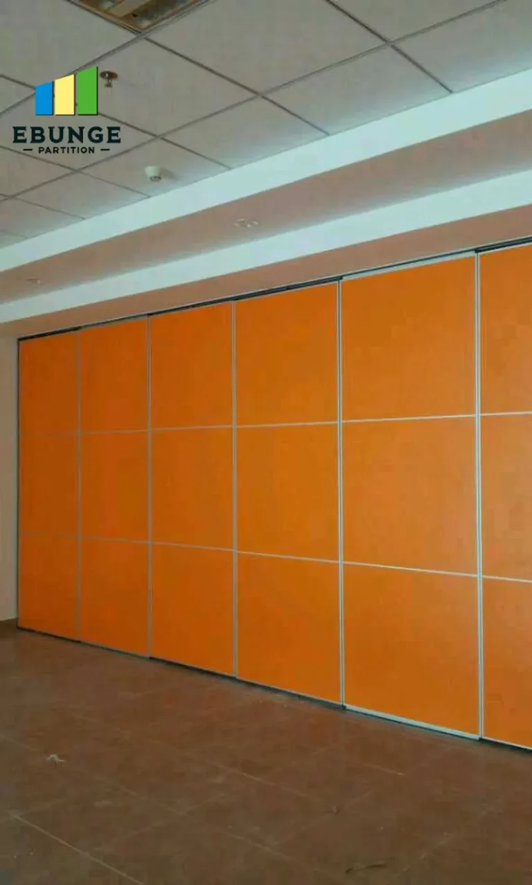 interior designer planning movable partition wall for restaurant private room