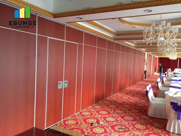 open-plan office with movable partition walls partially opened for flexible space