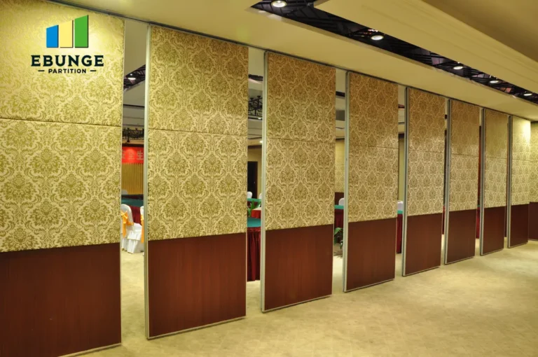 acoustic partition wall finish options in a modern school hall