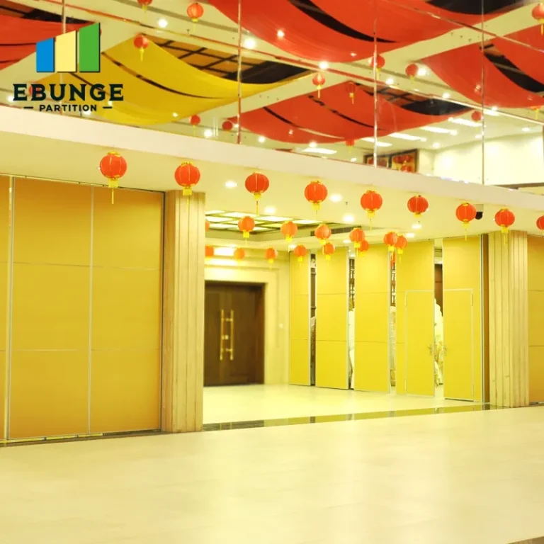 folding partition wall design in a community center with acoustic panels