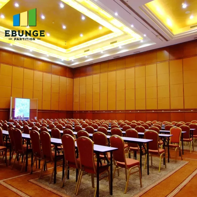 operable wall installation in a school hall with acoustic panels