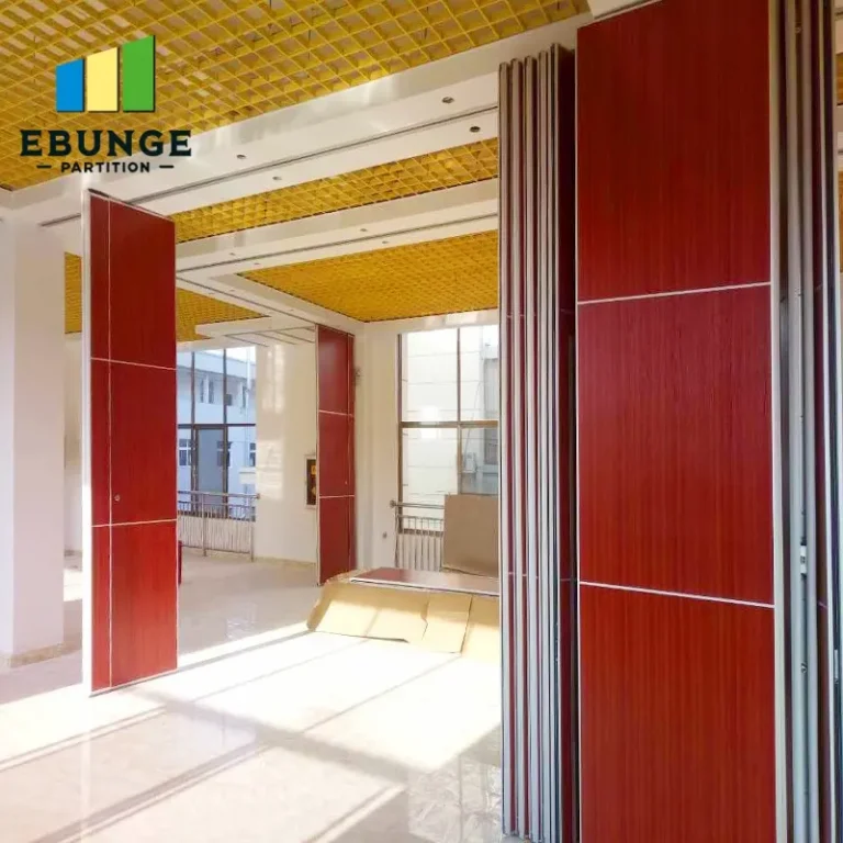 folding partition wall track system in a conference room