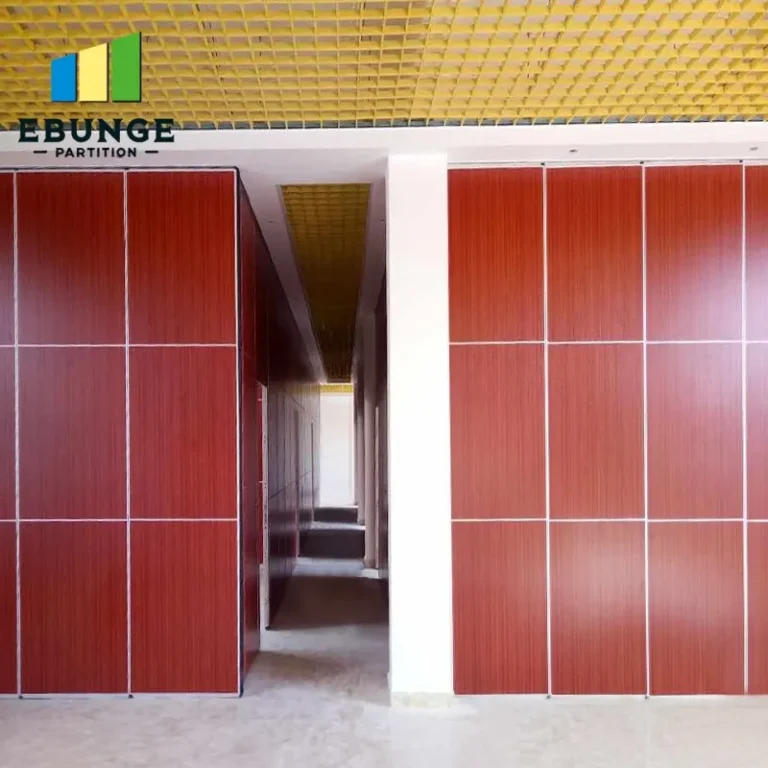 folding acoustic partitions in a school hall dividing the space