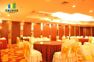 folding acoustic partitions in a community center