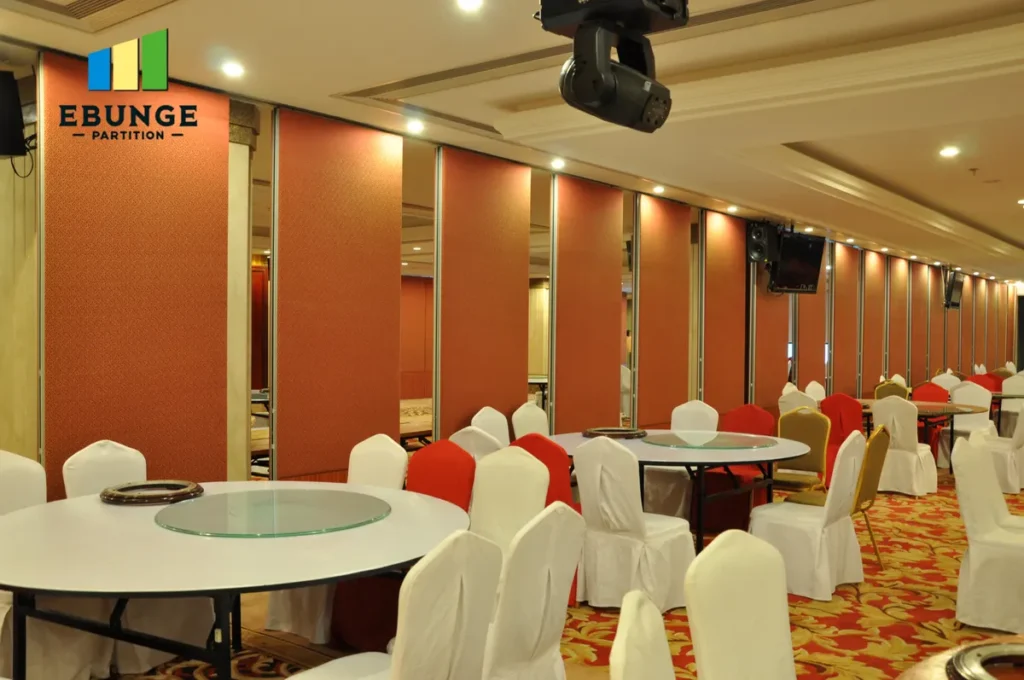 movable acoustic wall partition system in a modern office meeting room