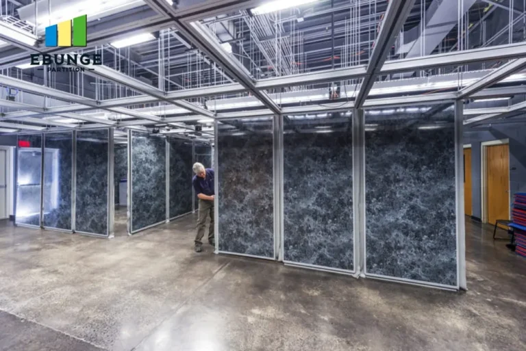 top-hung track system for flexible partition wall without floor rail