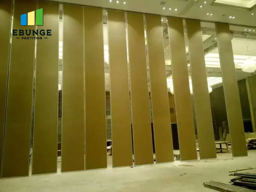 architect comparing movable partition manufacturer options for office meeting room