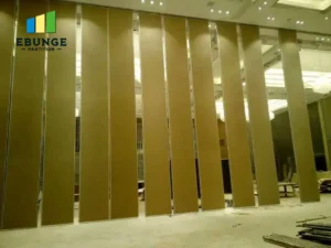architect comparing movable partition manufacturer options for office meeting room