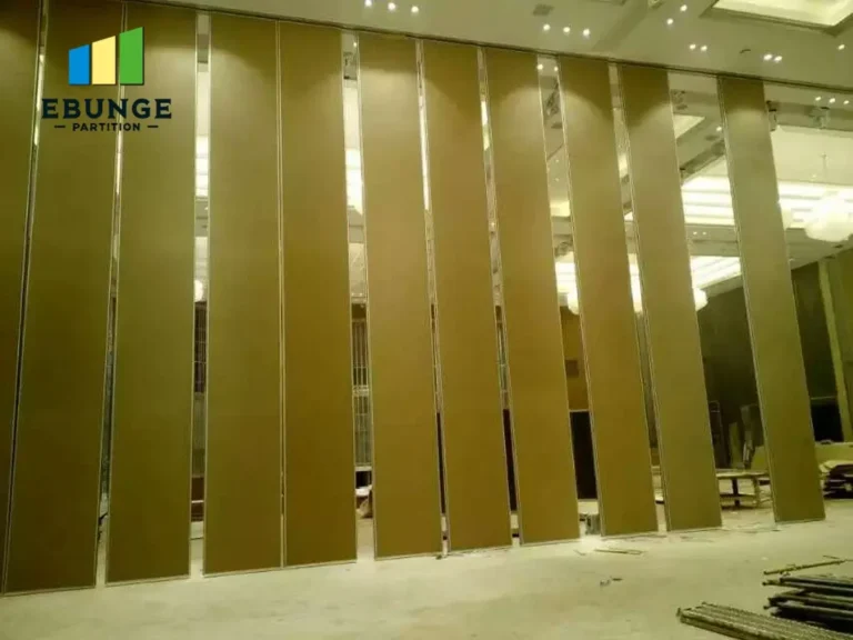 architect comparing movable partition manufacturer options for office meeting room