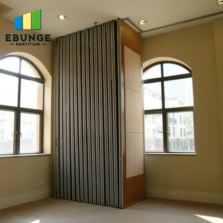 contractor evaluating movable partitions in a hospital consultation space