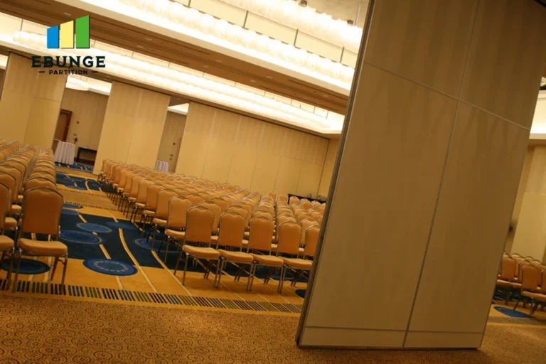 movable partition ceiling support in a training center with acoustic panels