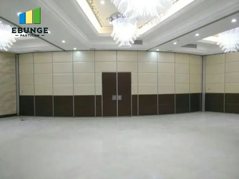 sliding partition wall with door in a modern school hall