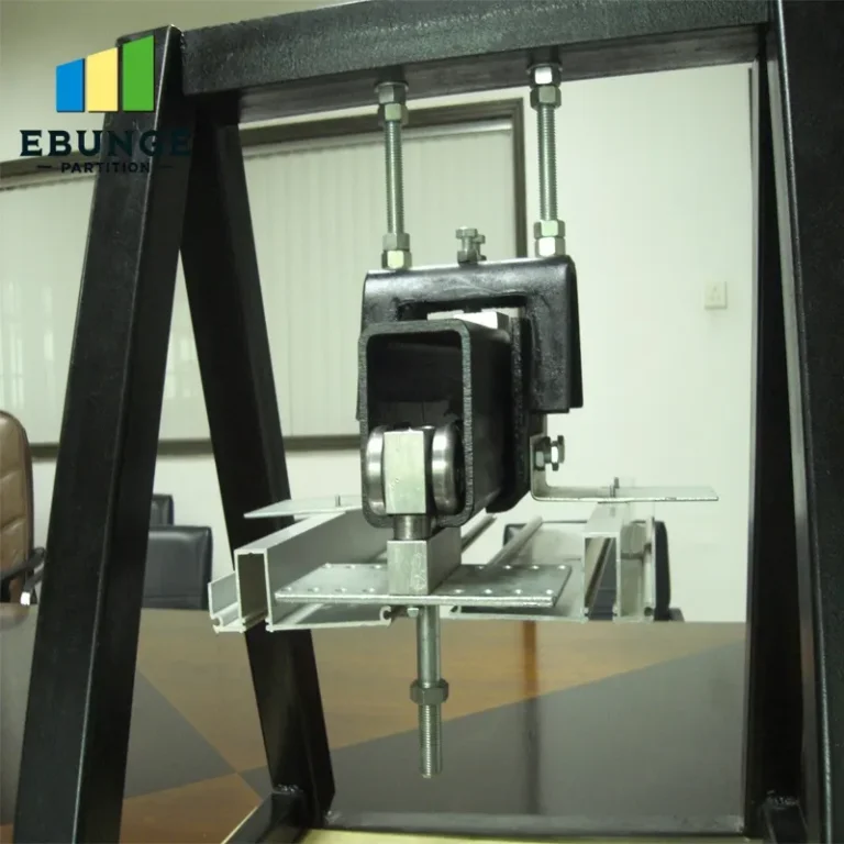 a wide shot of a folding partition wall with door dividing an exhibition hall