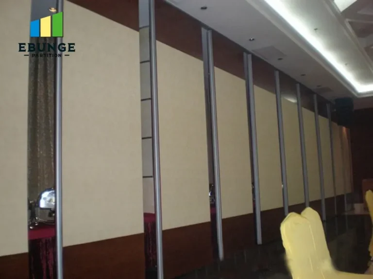 of a school hall with movable wall system in action
