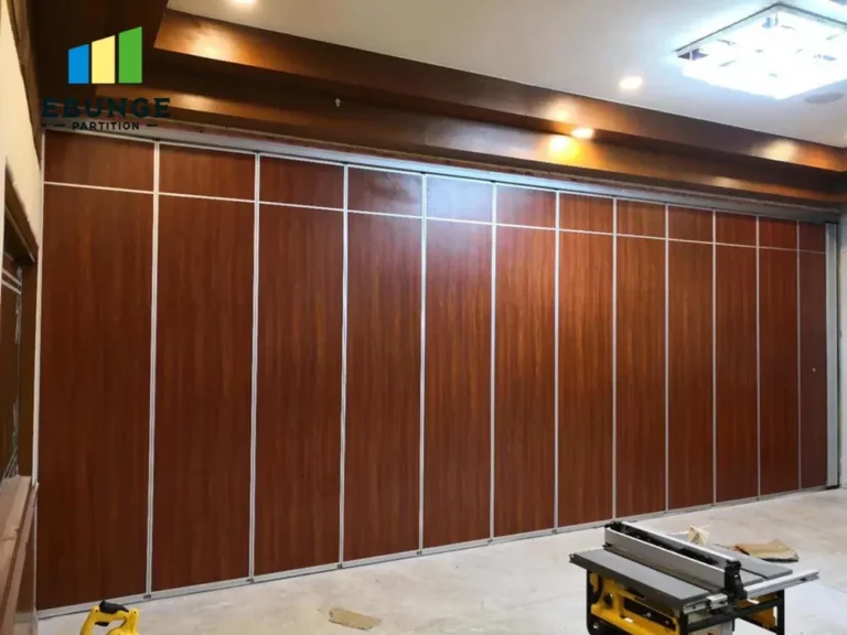 school hall with movable partition wall in open and closed positions