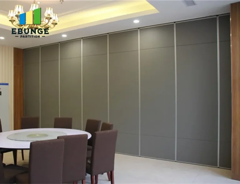 movable partition wall panels stacked neatly in a school hall