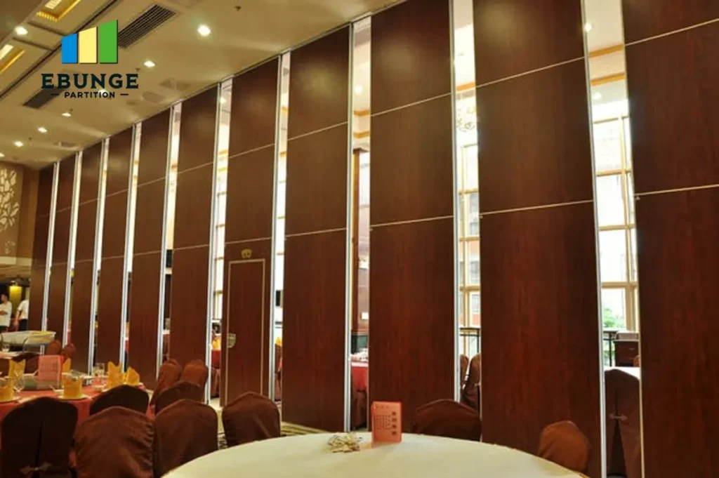 acoustic folding partitions dividing a conference room into two flexible spaces