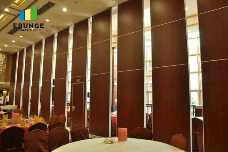 acoustic folding partitions dividing a conference room into two flexible spaces