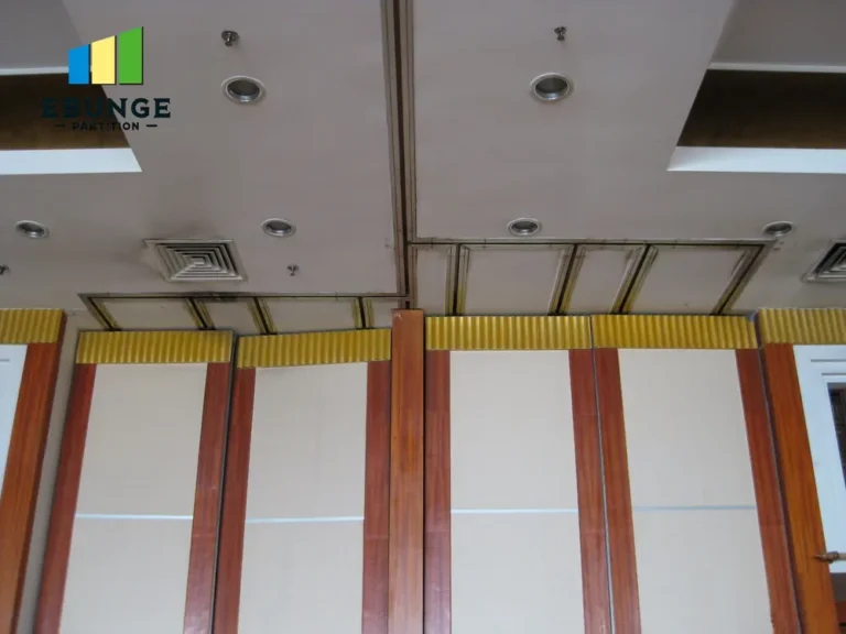 close-up of a top-hung track system for folding partitions