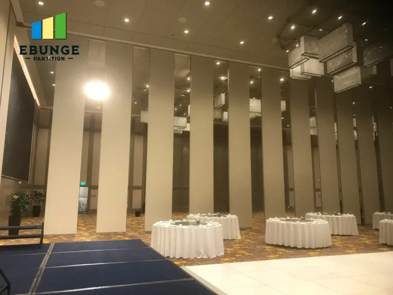 outdoor sliding partitions in a community center with acoustic insulation