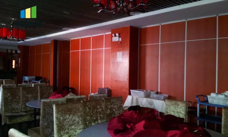movable partition wall in a community center with acoustic panels