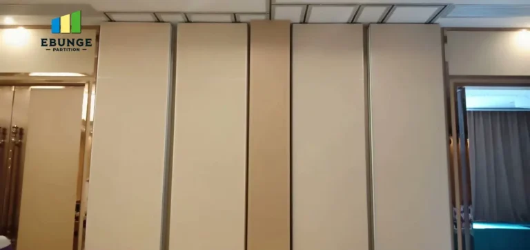 community movable partition maintenance checklist with technician inspecting acoustic partition