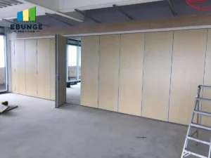 movable partition wall in a modern school hall in uae