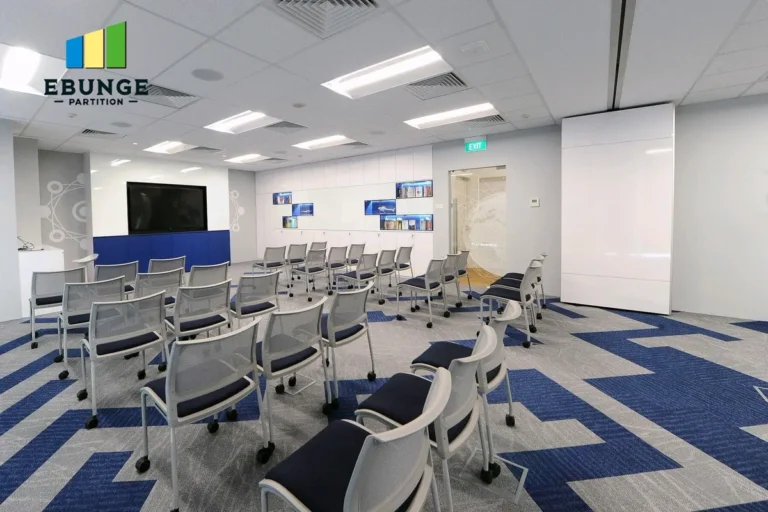 movable partitions in a school hall with acoustic panels
