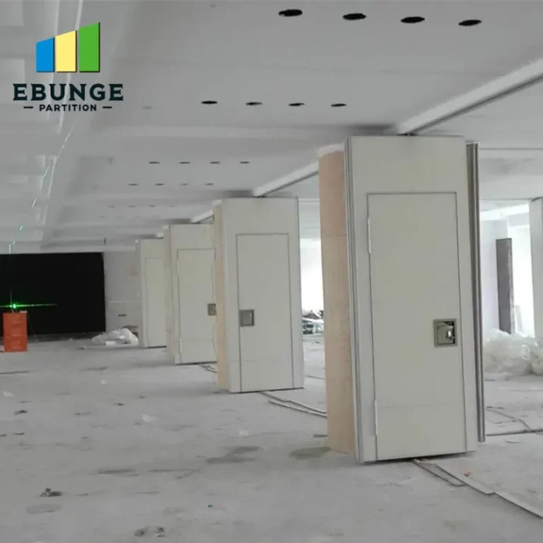 of a school hall with movable partition walls in action