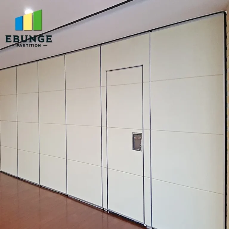 of sliding partitions dividing a large hospital room into private consultation areas