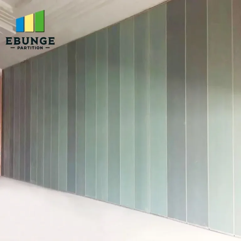 sliding folding wall dividing a training center into two rooms