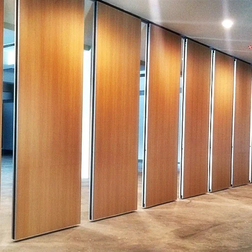 Partially opened wood-finish movable partition panels in an interior space