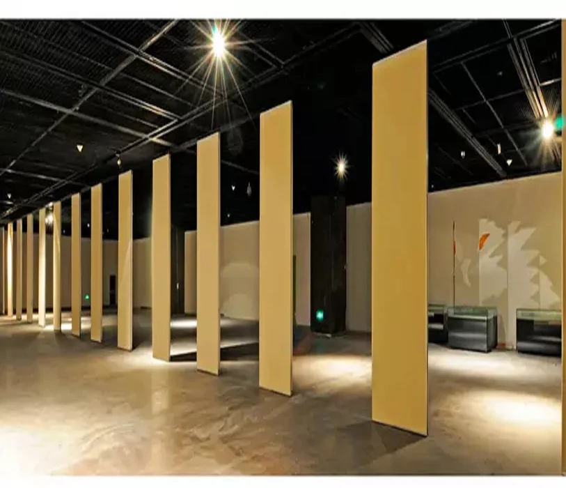 Tall movable partition panels opened across an exhibition interior