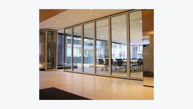 Top-hung operable wall in a multi-purpose hall