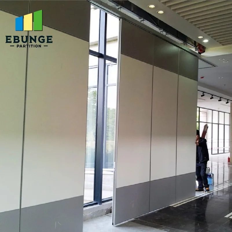 Movable partition panels beneath a visible overhead track
