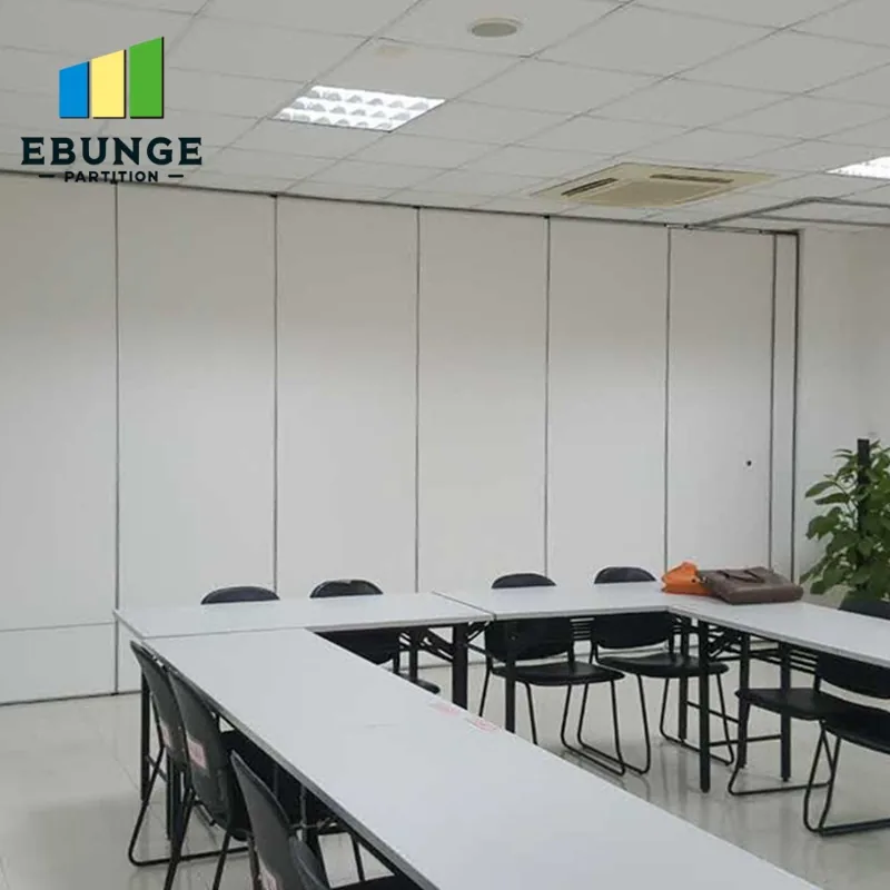 Real meeting room with white movable partition and table layout