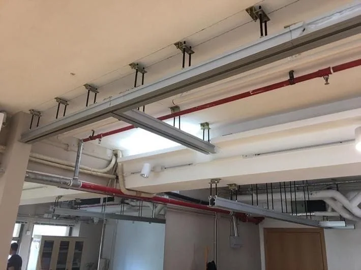 Real suspended aluminum partition track and support brackets during installation