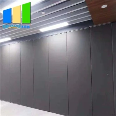 Top-hung solid operable wall panels in a multi-purpose room