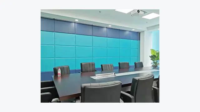 Top-hung operable wall dividing a multi-purpose meeting room
